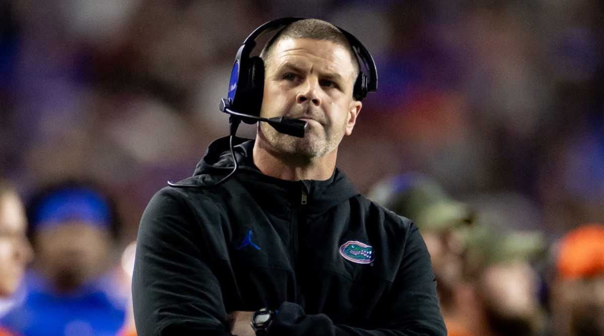 Florida coach Billy Napier with his arms crossed